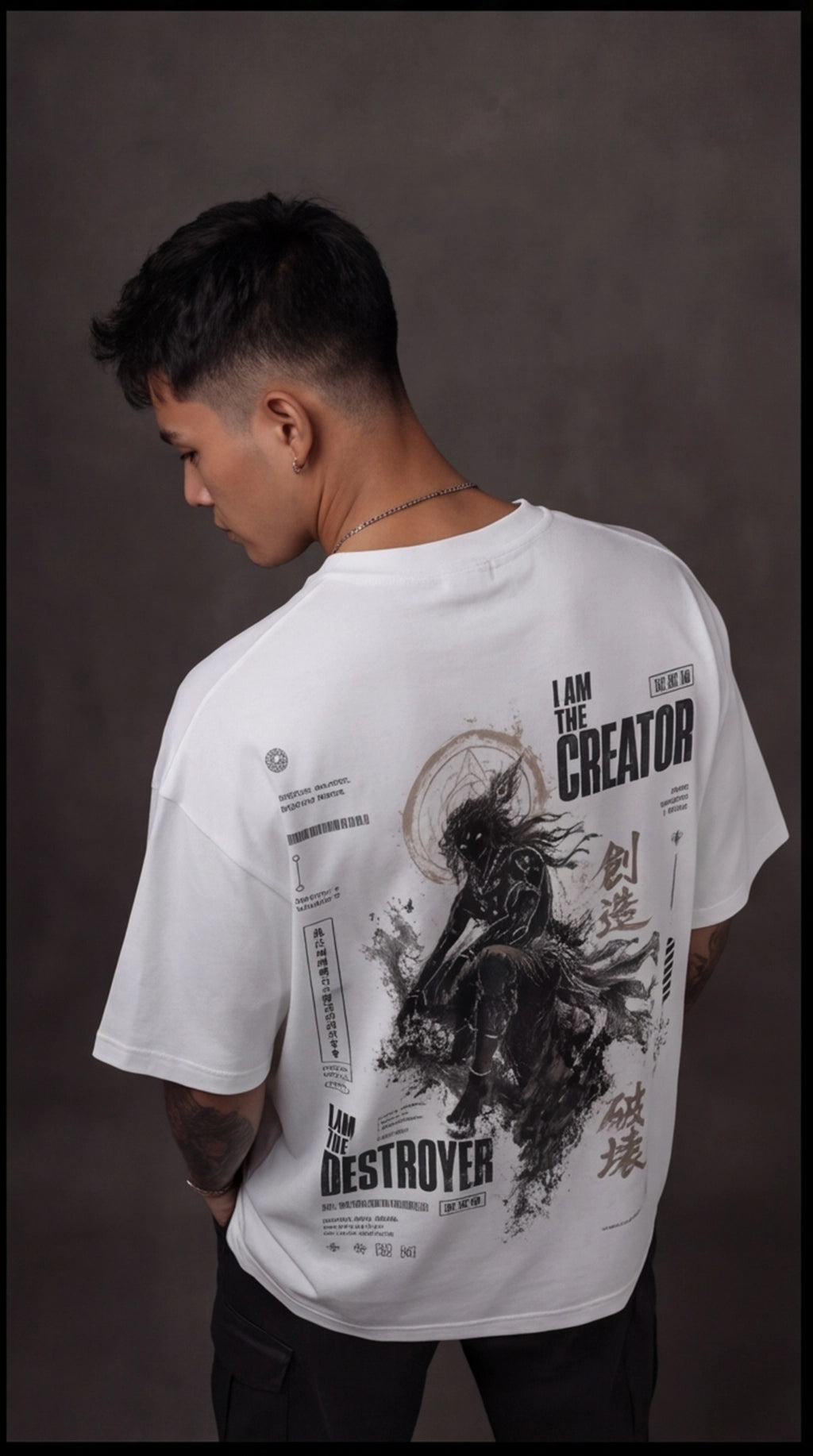 Ouffits white mythic warrior graphic oversized t-shirt — Creator & Destroyer – Person wearing a white t-shirt with black graphics and text on a dark background