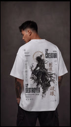 Ouffits white mythic warrior graphic oversized t-shirt — Creator & Destroyer – Person wearing a white t-shirt with graphic design and text on the back against a dark background
