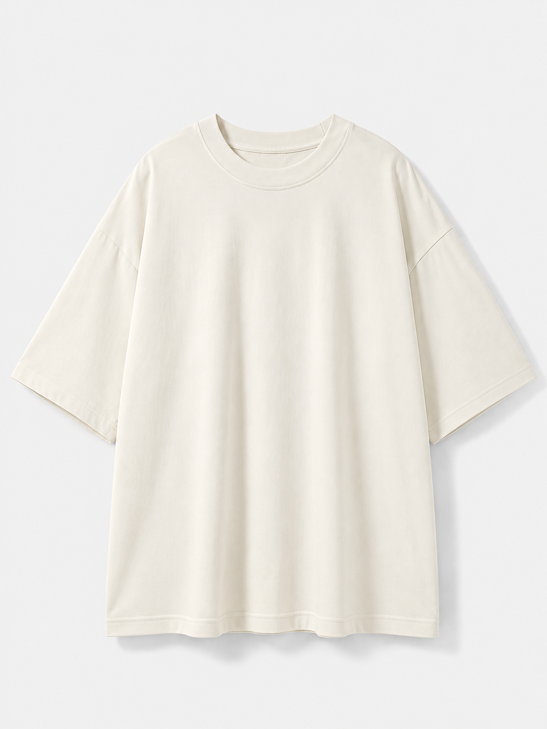 An oversized short-sleeve crewneck t-shirt in off white/cream, displayed flat against a light gray background.