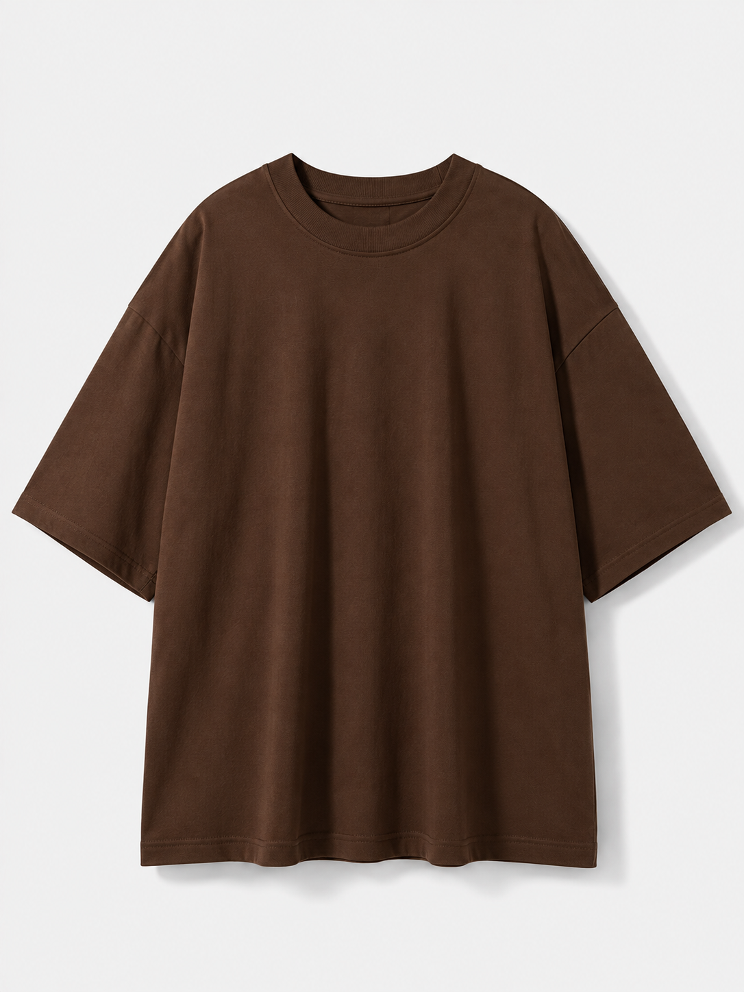 A solid brown short-sleeve crewneck t-shirt with an oversized, relaxed fit, displayed against a light gray background.