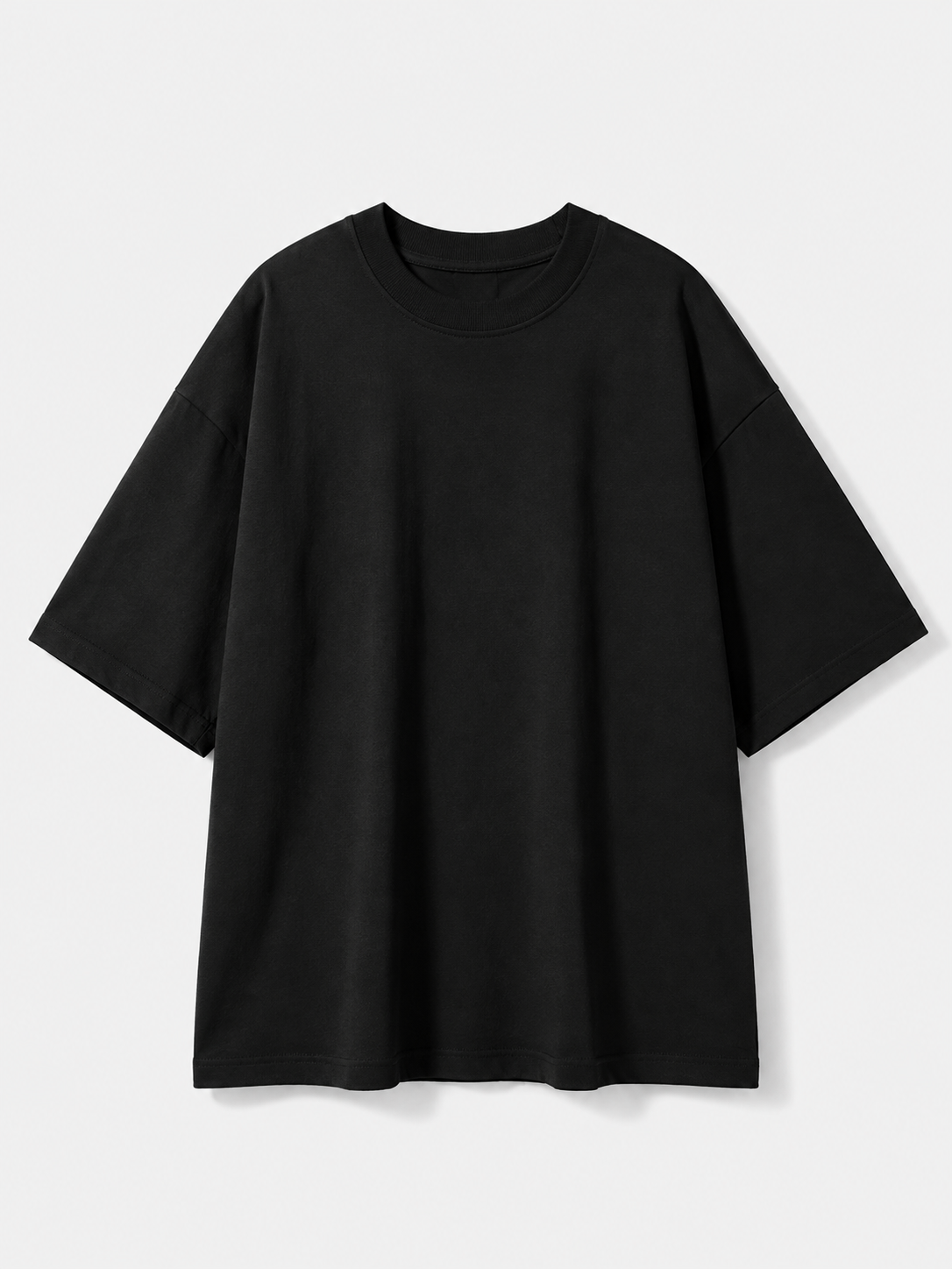 A plain black short-sleeve crewneck t-shirt with a relaxed, oversized fit, displayed against a light gray background.