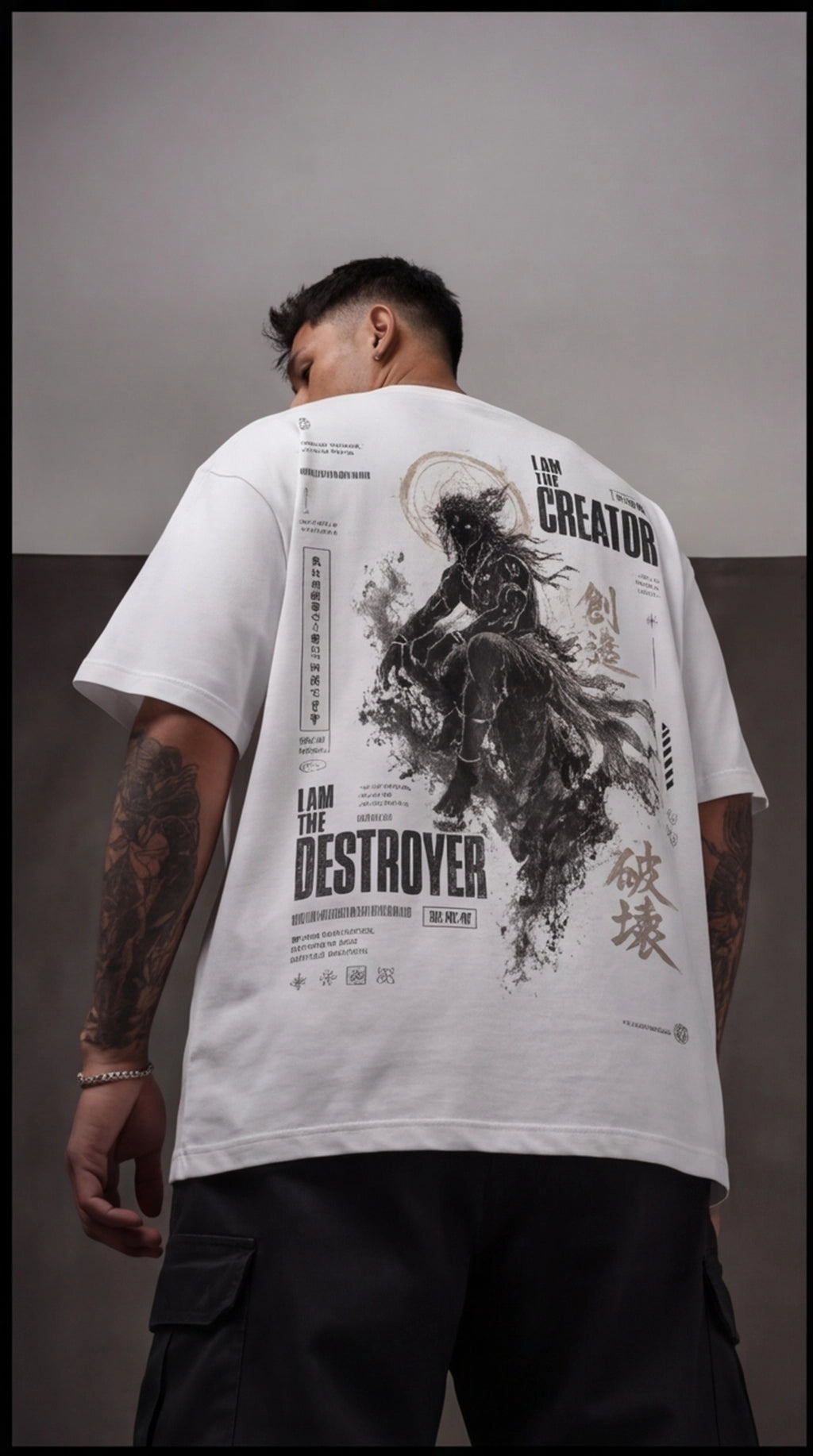 Ouffits white mythic warrior graphic oversized t-shirt — Creator & Destroyer – Person wearing a white t-shirt with black graphic design and text on the back.
