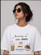 Running on Chai, Chaat & Zero Serotonin Oversized T-Shirt – White Graphic Tee